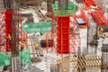 Aerial view of construction site workers with hooks for safety body harness. Building development concept Royalty Free Stock Photo