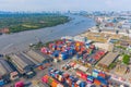 Aerial view of container cargo ship in the export and import business and logistics international goods in urban city. Shipping to