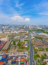 Aerial view of container cargo ship in the export and import business and logistics international goods in urban city. Shipping to