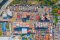 Aerial view of container cargo ship in the export and import business and logistics international goods in urban city. Shipping to