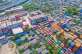 Aerial view of container cargo ship in the export and import business and logistics international goods in urban city. Shipping to