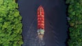 Aerial view of container cargo ship navigating canal, industrial transportation and shipping concept Royalty Free Stock Photo