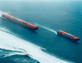 Aerial view container cargo ships in open sea. AI