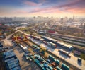 Aerial view of container loading and unloading at sunset Royalty Free Stock Photo