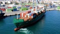 Aerial view of container ship approaching to the port of Alicante, Spain. Royalty Free Stock Photo