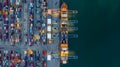 Aerial view container ship loaded in container terminal at night, Global business import export logistic and transportation, Royalty Free Stock Photo