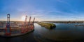 Aerial view of a container terminal in the port of Hamburg at sunset Royalty Free Stock Photo