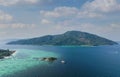 Aerial view of coral reef in Thailand with Tropical island with white sand beach and blue clear water and granite stones