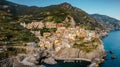 Aerial view of Corniglia and coastline of Cinque Terre,Italy.UNESCO Heritage Site.Picturesque colorful village on rock above sea.