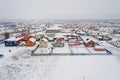 Aerial view of cottage village covered with white snow. Royalty Free Stock Photo