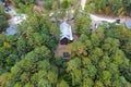 Cabins in the forest and cars parked nearby in the woods. in Broken Bow, Oklahoma USA.