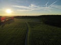 Aerial view of country fields while the sun goes down