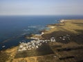 Aerial view of the country of Orzola and the indented coastline of the island of Lanzarote, Canary Islands, Spain. Africa