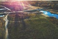 Aerial view of countryside and brook in evening