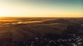 Aerial view of countryside village panorama in autumn sunset Royalty Free Stock Photo