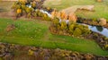 Aerial view of cows grazing on a pasture near river. Royalty Free Stock Photo