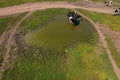 Aerial view of cows herd grazing on pasture field, top view drone pov , in grass field these cows are usually used for Royalty Free Stock Photo