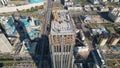 Aerial view of a crane over the skyscraper building  -construction in an urban city Royalty Free Stock Photo