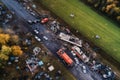 aerial view of crash site surrounded by emergency vehicles