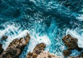 Aerial View of Crashing Ocean Waves on Rocky Shore. Generative ai Royalty Free Stock Photo