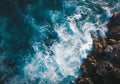 Aerial View of Crashing Ocean Waves on Rocky Shore. Generative ai Royalty Free Stock Photo