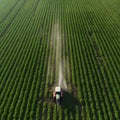 Aerial view of crop sprayer spraying