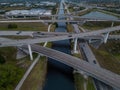 Aerial view of crossing highway roads above Florida during the sunrise