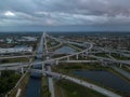 Aerial view of crossing highway roads above Florida during the sunrise