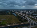 Aerial view of crossing highway roads above Florida during the sunrise