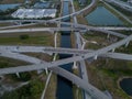 Aerial view of crossing highway roads above Florida during the sunrise