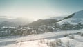 Aerial shot of hotels and an Alpine ski track in famous Alpe d'Huez ski resort, France