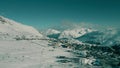 Panoramic aerial shot of crowded Alpe d'Huez French ski resort on a winter sunny day. High season in the Alps Royalty Free Stock Photo