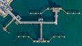 Aerial view crude oil terminal, Loading arm oil and gas refinery at commercial port