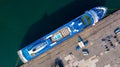 Aerial view cruise ship parking the pier, Cruise ship at harbor. Aerial view beautiful large white ship, Top view from drone of