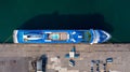 Aerial view cruise ship parking the pier, Cruise ship at harbor. Aerial view beautiful large white ship, Top view from drone of