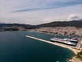 Aerial view cruise ship in port of Kavala. Visitors can enjoy breathtaking panoramas of the city's colorful