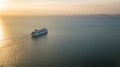 Aerial view Cruise ship at sunset in ocean, Aerial view large cruise ship at sea, Passenger cruise ship vessel, sailing across the Royalty Free Stock Photo