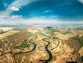 Aerial View Curved River In Early Spring Landscape. Top View Of Beautiful European Nature From High Attitude. Drone View