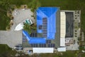 Aerial view of damaged in hurricane Ian house roof covered with blue protective tarp against rain water leaking until Royalty Free Stock Photo