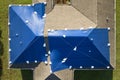 Aerial view of damaged in hurricane Ian house roof covered with blue protective tarp against rain water leaking until Royalty Free Stock Photo