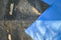 Aerial view of damaged in hurricane Ian house roof covered with blue protective tarp against rain water leaking until Royalty Free Stock Photo