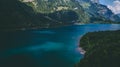 Aerial view of deep blue mountain lake in swiss alps, klontalersee switzerland Royalty Free Stock Photo