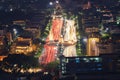 Aerial view of Democracy monument with car light trails on road in Bangkok Downtown, urban city at night, Thailand. Landmark Royalty Free Stock Photo