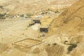 An aerial view of the desert floor in the Southern District of Israel taken from the Masada Clifftop on a hazy day