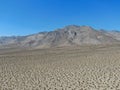 Aerial view of desert hills under blue sky in California`s Mojave desert, near Ridgecrest. Royalty Free Stock Photo