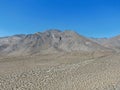 Aerial view of desert hills under blue sky in California`s Mojave desert, near Ridgecrest. Royalty Free Stock Photo