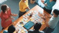 Aerial view of developer team discussing and show digital program. Symposium. Royalty Free Stock Photo