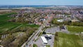 An aerial view of Dinteloord between farmland in typical flat Dutch landscape.