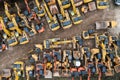 Aerial view directly above industrial machinery and vehicles for hire