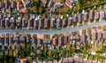 Aerial view directly above a road through a suburban housing estate Royalty Free Stock Photo